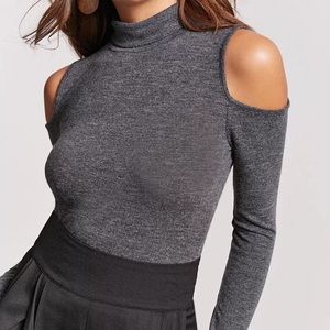 Open-shoulder turtleneck sweater